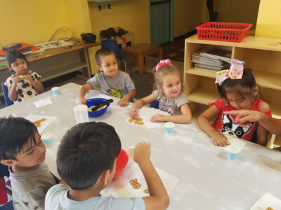 preschoolers eating snack at only love children's center