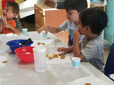 group of boys eating snack
