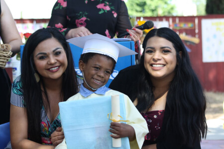teachers with Pre-K graduate